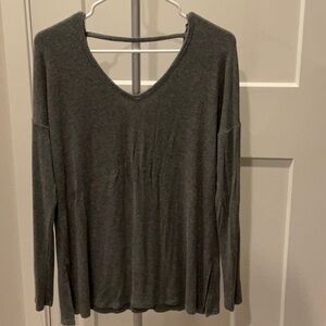 Size medium garage long sleeve V-neck ribbed top.